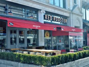 commercial awning outside new york city restaurant Red Rooster