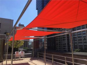 commercial awnings for rooftop patio shade sail in red