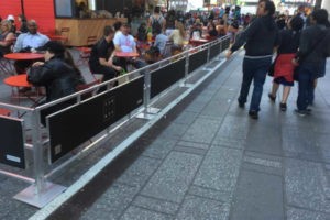 Sidewalk cafe barriers outside restaurant