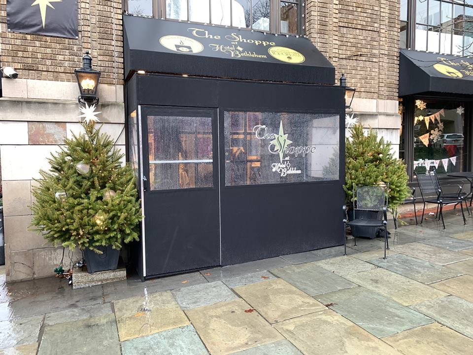 temporary winter vestibule enclosure outside store in NYC